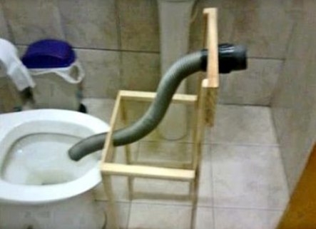 Célzókészülék egy kocsmai budiban