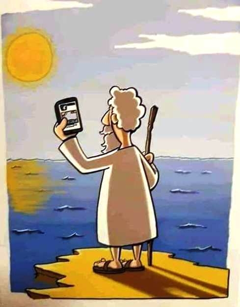 Mózes, amint épp megosztja a tengert